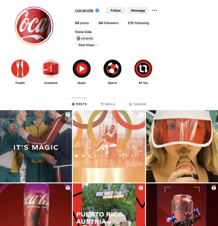 Coca-Cola Instagram profile featuring a red logo, 69 posts, 3M followers, and 270 following. The grid displays recent posts with themes like magic, festivals, and sports, emphasizing Coca-Cola's diverse branding approach.